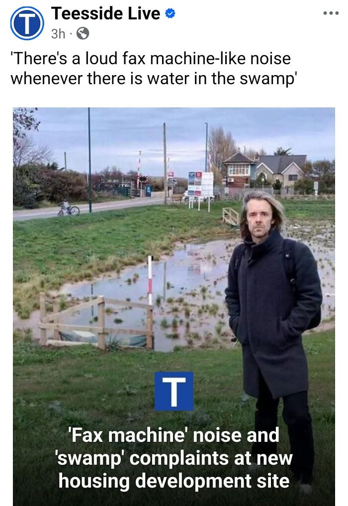 Man standing near flooded swamp at housing development site, featured in local newspaper headlines showing world madness.
