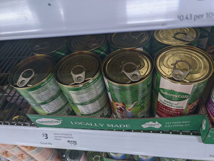 Someone Slightly Opened The Dog Food Cans