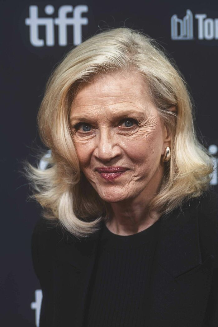 Diane Sawyer at a film event, wearing a black outfit, showcasing her career highlights and professional presence.