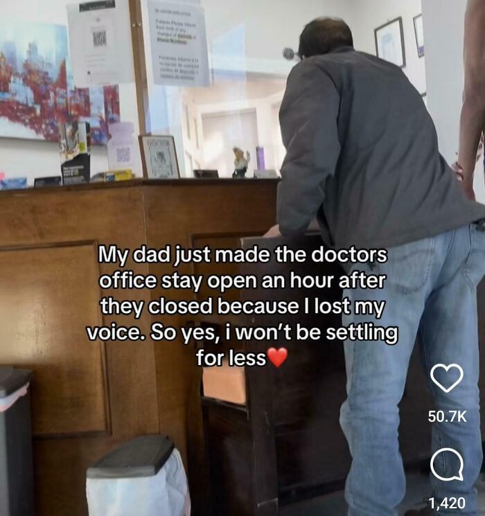 Man leaning over a doctor's office reception counter with overlay caption about dad staying open - next-level jerks