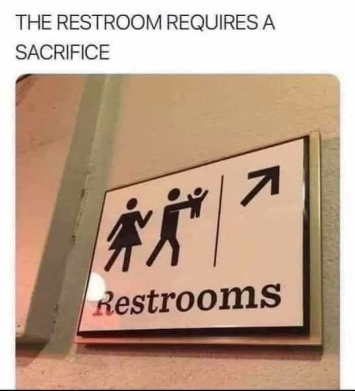 Funny stupid signs pic of restroom sign showing a figure holding a baby with caption The restroom requires a sacrifice