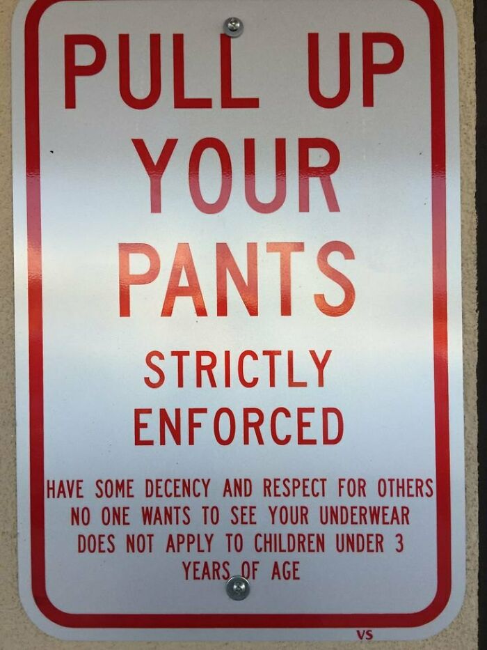 Funny stupid signs pics warning to pull up pants with decency and respect, strictly enforced except for young children.
