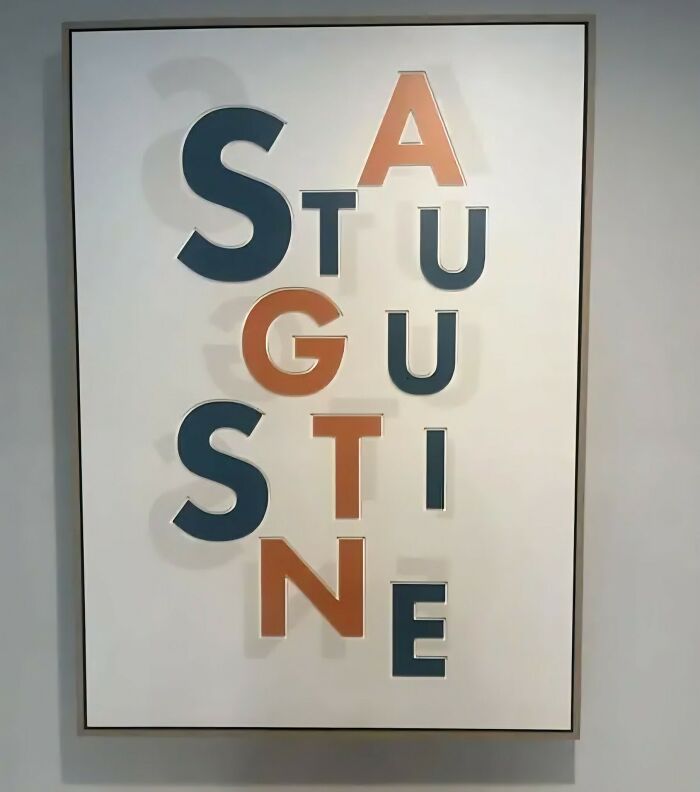 Wall sign with letters arranged vertically and horizontally spelling confusing words, a funny stupid signs pics example.