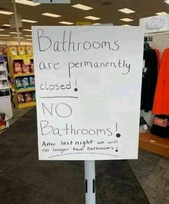 Handwritten funny stupid sign in a store stating bathrooms are permanently closed and no bathrooms available.