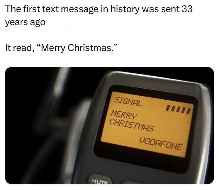 First text message reading Merry Christmas on an old mobile phone, evoking 90s and 2000s nostalgia.
