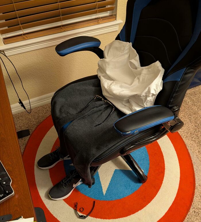 Funny pictures: clothes draped over gaming chair like a person, glasses and sneakers on a Captain America rug