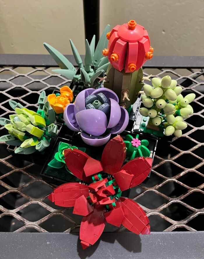 Colorful LEGO succulent and cactus plants arranged on a metal table, a popular gift teens are begging Santa for this year.