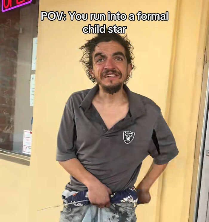 Man in worn clothes standing outside a building, highlighting Tylor Chase&rsquo;s co-star homelessness and urgent support request.