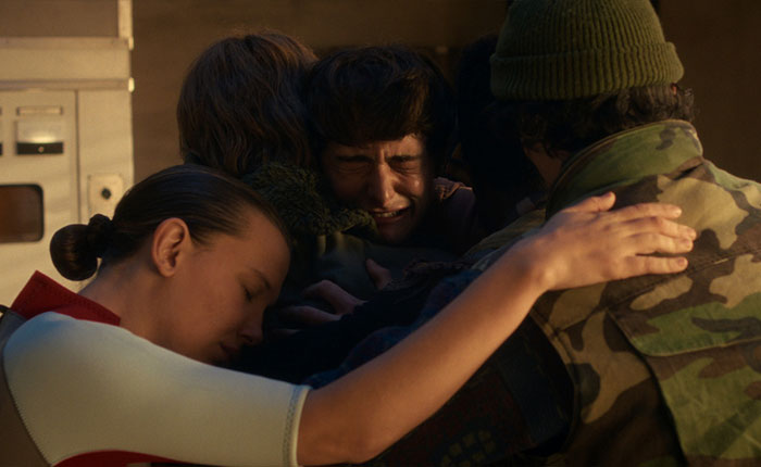 Stranger Things 5 cast in emotional group hug scene, highlighting the comically bad reaction to the latest episode online. Stranger Things 5 cast in emotional group hug scene, highlighting the comically bad reaction to the latest episode online.