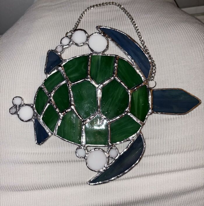 Stained glass sea turtle ornament featuring green and blue panels, perfect gifts for the friend from a Hobby Lobby isle.
