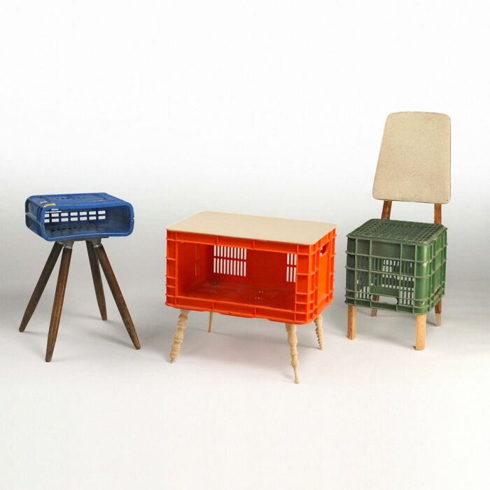 Three uniquely designed pieces of furniture made from repurposed crates with wooden legs and a chair back, trippy picture style.