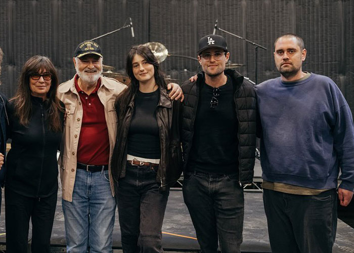 Group of five people posing together indoors, highlighting Rob Reiner&rsquo;s son amid a serious family-related news event.