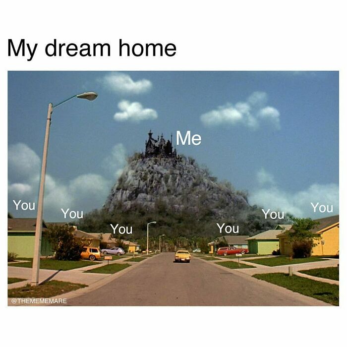 Suburban street with houses labeled you and a dark castle on a hill labeled me, representing goth memes about not fitting in.