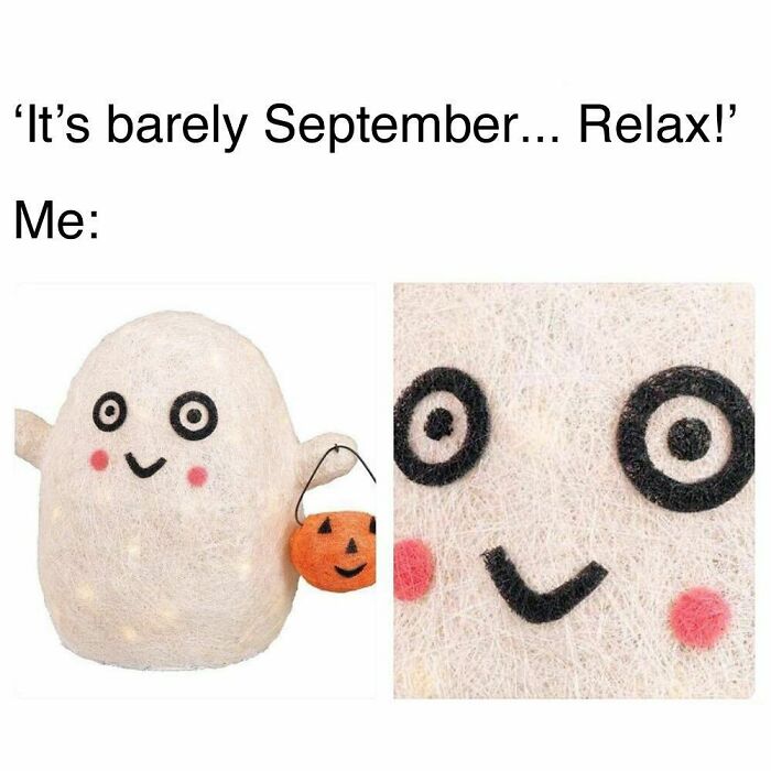 Cute ghost holding a pumpkin with a smiling face, illustrating goth meme humor about early September excitement.