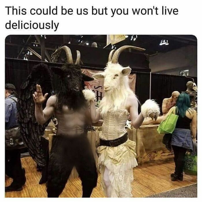 Two people in elaborate goth costumes with goat heads and horns at a convention, representing goth memes humor.