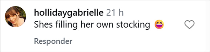 Comment on social media post reading shes filling her own stocking with laughing emoji, related to Jennifer Lopez fans noticing a depressing detail in new Christmas video.