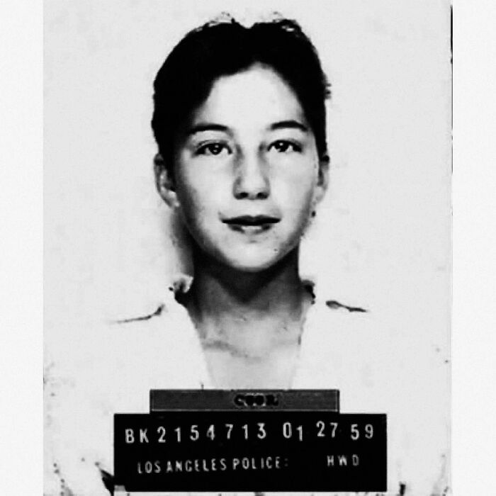 Black and white mugshot of a young woman by Los Angeles Police, part of celebrity mugshots after being arrested collection.