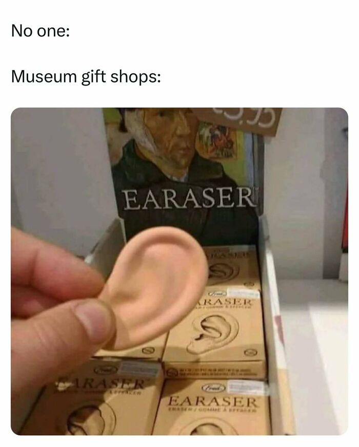 Hand holding a realistic ear-shaped eraser in a box labeled earaser, a funny dad joke about museum gift shops.