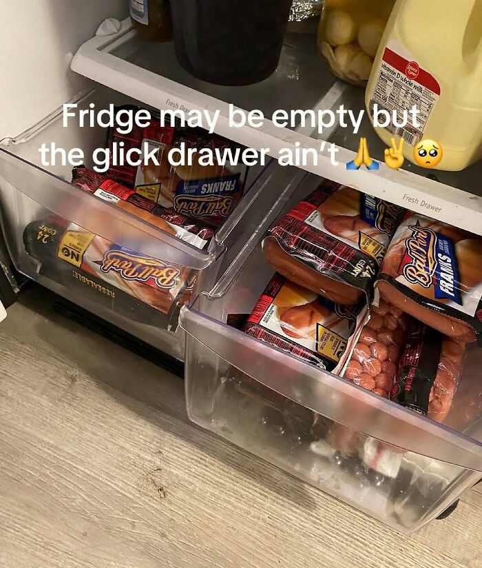 Open fridge drawers filled with various packaged meats and snacks in a creative dude fridge setup.