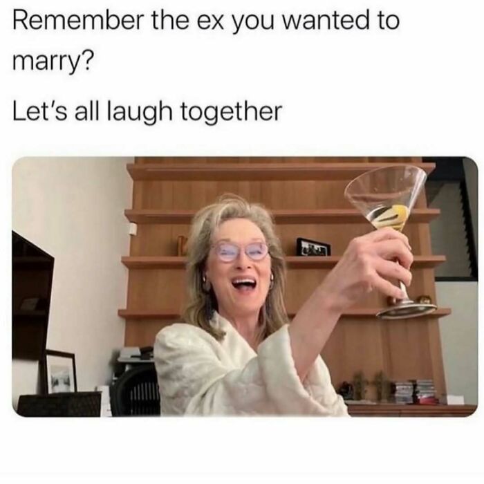 Woman in glasses and robe laughing and raising a martini glass with text about laughing at the ex you wanted to marry meme