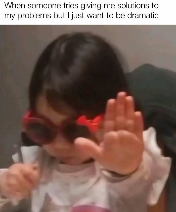 Toddler wearing red sunglasses with hand raised, caption about wanting to be dramatic, a funny meme for therapy wait time.