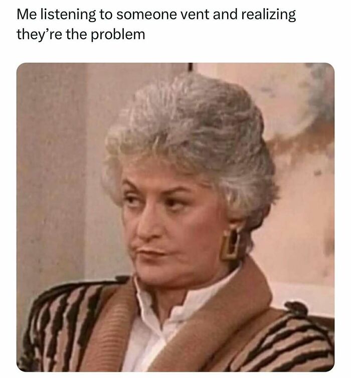 Woman with gray hair giving a skeptical look, representing hilarious memes to scroll through while waiting for therapist.