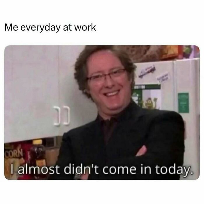 Man with glasses smiling in kitchen with meme text about almost not coming into work, relatable funny meme for therapist wait time.