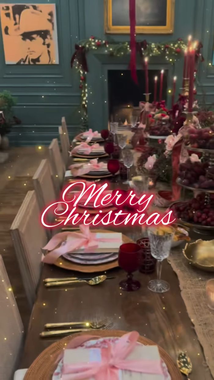 Festive Christmas dining table set with elegant decor and soft lighting, highlighting an odd detail in Jennifer Lopez’s photo.