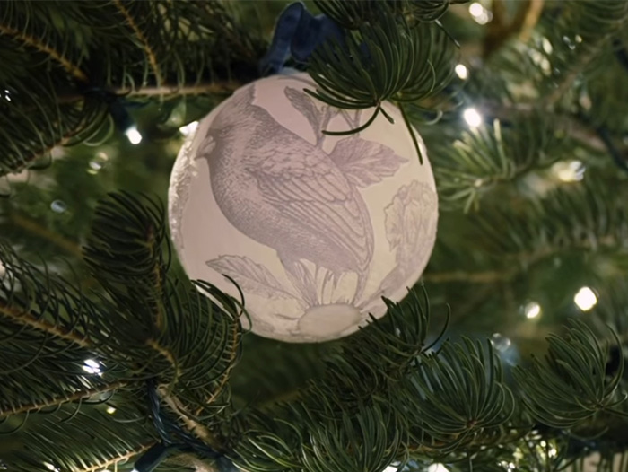 Christmas tree with Melania Trump&rsquo;s new ornament featuring a bird design sparking outrage over its cost.
