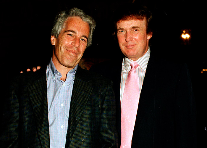 Jeffrey Epstein and Donald Trump standing together at a nighttime event with the chilling toddler's foot implied nearby.