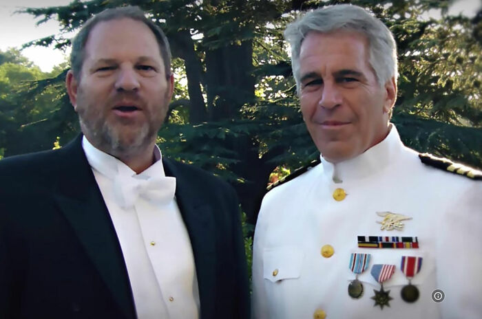 Harvey Weinstein and another man in formal attire outdoors, related to Dame Judi Dench's defense controversy. Harvey Weinstein and another man in formal attire outdoors, related to Dame Judi Dench's defense controversy.