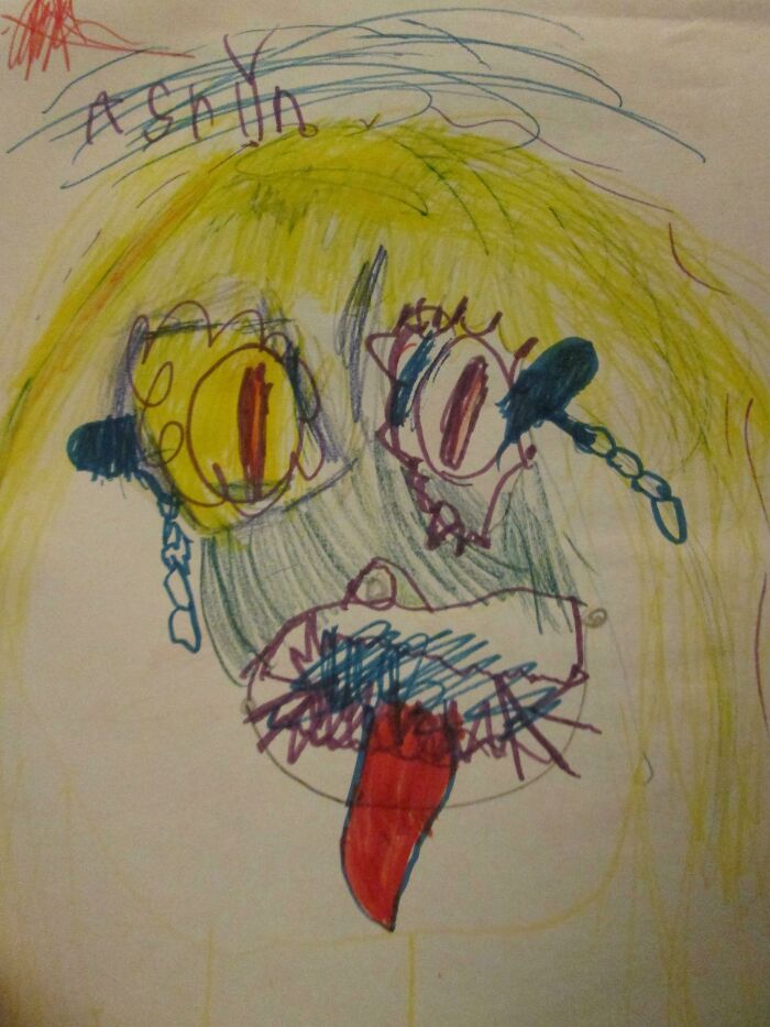 Child’s funny drawing of a face with exaggerated features and bright colors in a very flattering portrait style.