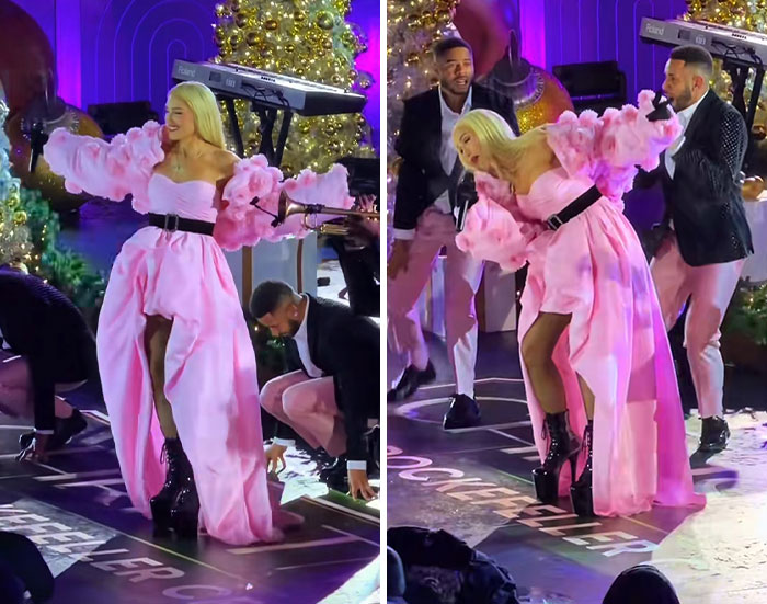 Gwen Stefani performing at Rockefeller Tree Lighting in a bold pink gown sparking controversy over her outfit choice.