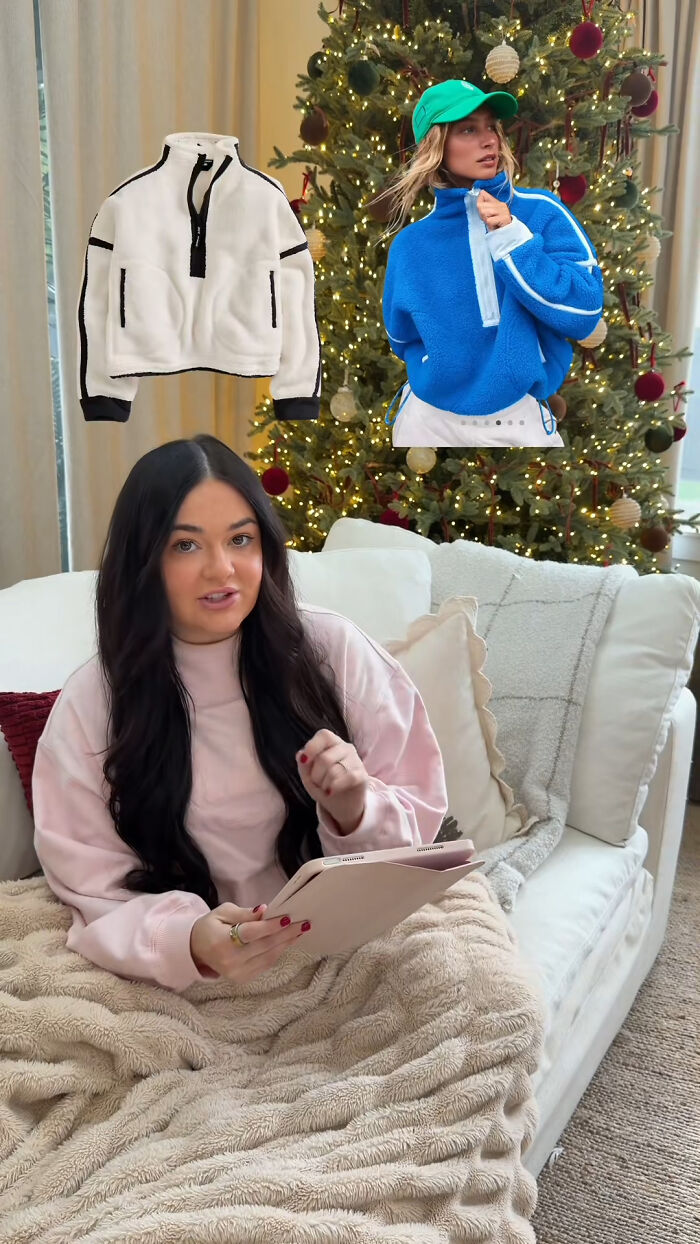 Woman on couch by Christmas tree with fleece jackets featured as top Christmas gifts people recommend.
