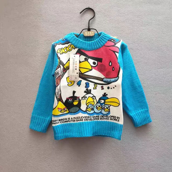 Colorful kids' sweater featuring Angry Birds characters, highlighting a unique and strange kid's insult in art form.