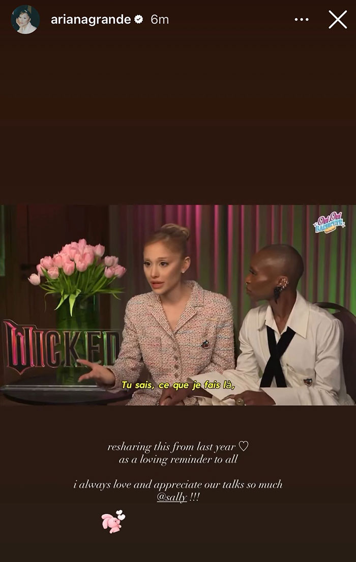 Ariana Grande in an interview setting sharing an urgent reminder about body-shaming with a fellow guest. Ariana Grande in an interview setting sharing an urgent reminder about body-shaming with a fellow guest.