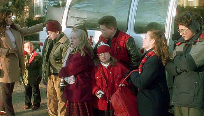 Scene from Home Alone with children dressed in winter clothes, relating to Macaulay Culkin addressing Kevin&rsquo;s dad job theory.