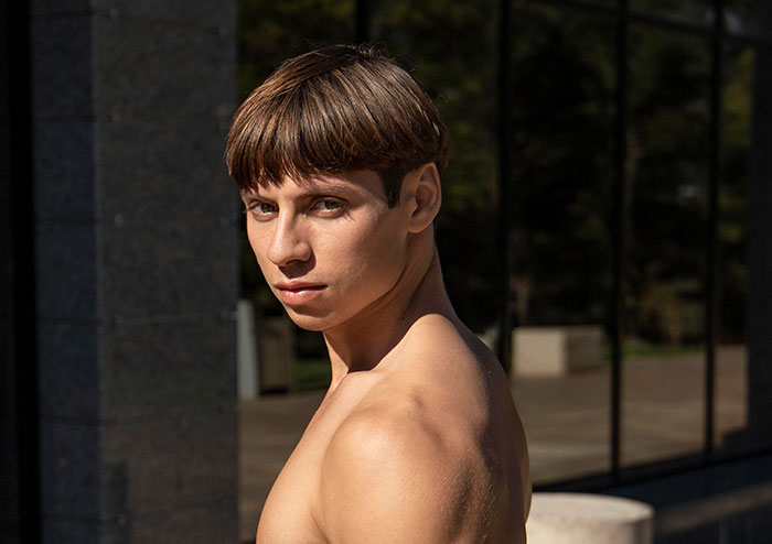 Young man outdoors with an intense look, representing the spirit of chaotic good actions and moments captured.