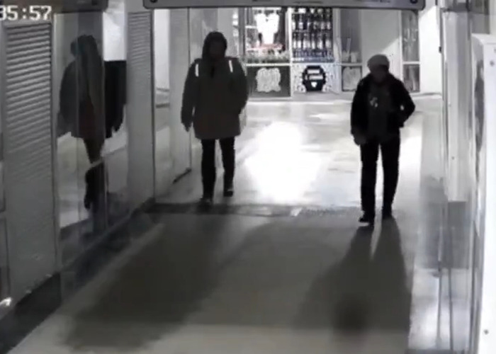 CCTV footage showing delivery man approaching woman in hallway before sudden violent attack in disturbing psychopath incident. CCTV footage showing delivery man approaching woman in hallway before sudden violent attack in disturbing psychopath incident.