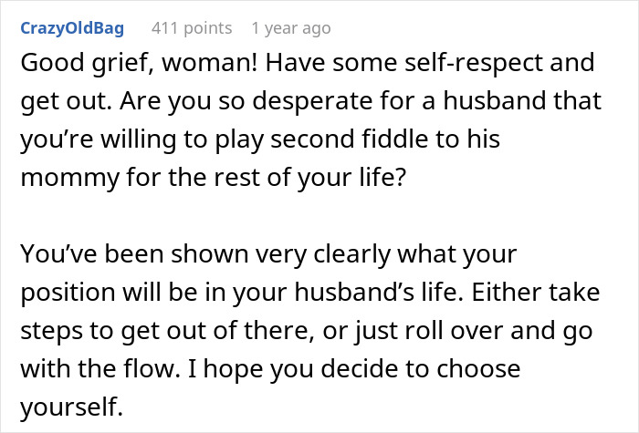Comment discussing a mother-in-law deciding to wear a white dress to her son's wedding and causing tension with the bride.