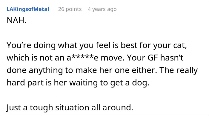 Screenshot of a forum comment discussing a woman upset her girlfriend won’t let her get a dog due to her old cat. Screenshot of a forum comment discussing a woman upset her girlfriend won’t let her get a dog due to her old cat.