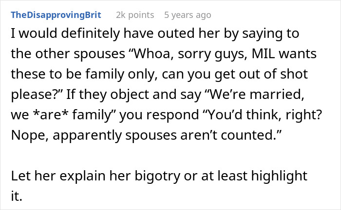 Online comment discussing a woman excluded from family photos by homophobic mother-in-law and related bigotry.