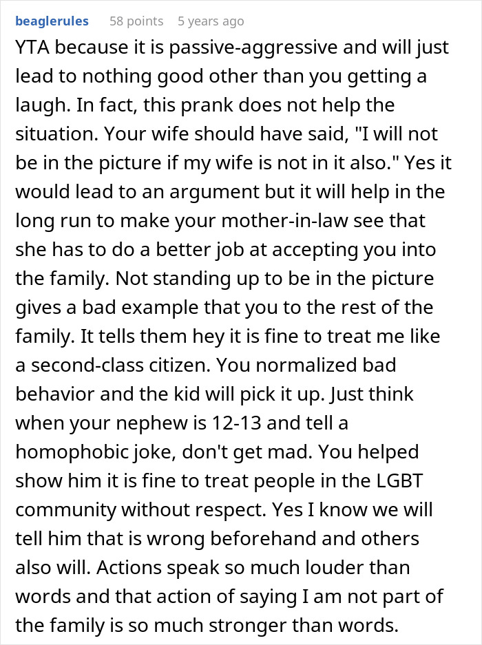 Comment on family discord and homophobic mother-in-law excluding woman from family photos causing tension.
