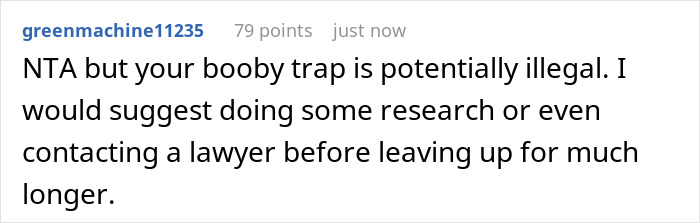 Screenshot of a comment discussing potential illegality of a neighbor&rsquo;s booby trap after yard damage dispute.