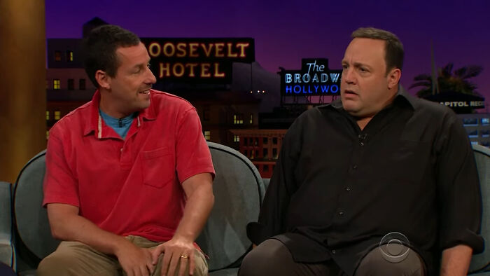 Two men sharing a candid moment on a talk show, illustrating memorable encounters with different celebrities.