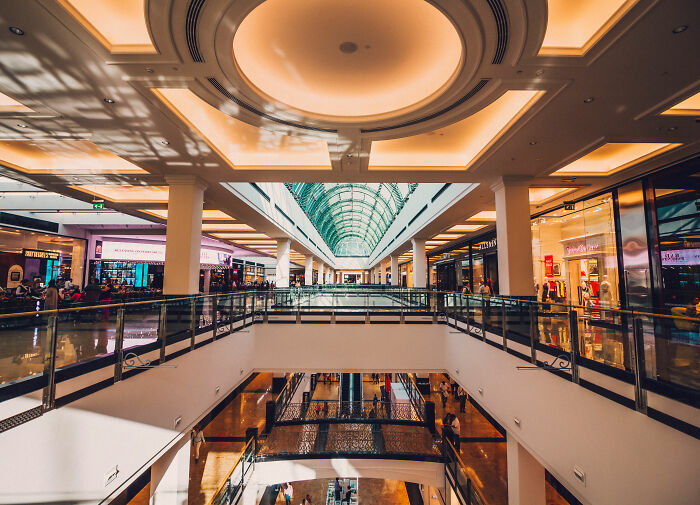 Interior view of Dubai Mall with shoppers and stores amid reports of a crypto scammer case linked to dismemberment. Interior view of Dubai Mall with shoppers and stores amid reports of a crypto scammer case linked to dismemberment.
