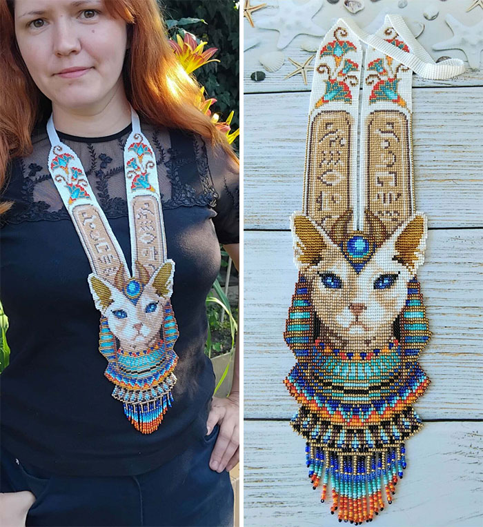 Woman wearing a detailed beaded necklace featuring a colorful Egyptian cat design, showcasing cool handmade crafts.