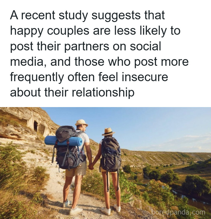 Couple hiking outdoors holding hands with backpacks, illustrating fun and fascinating psychology facts on relationships.