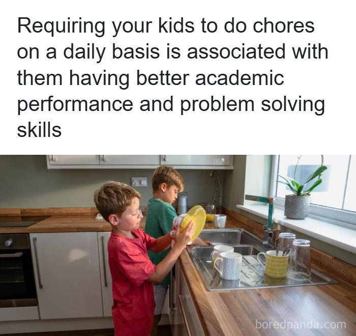 Two kids washing dishes in a kitchen, illustrating psychology facts about chores improving problem solving skills and academics.