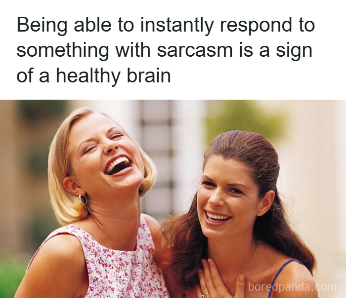 Two women laughing together, illustrating fun and fascinating psychology facts about brain health and sarcasm response.